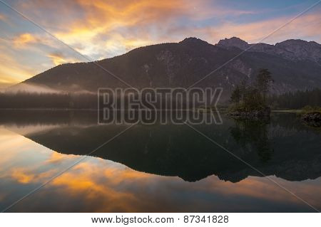 Alpine lake,Sunrise over the alpine lake Laghi di Fusine