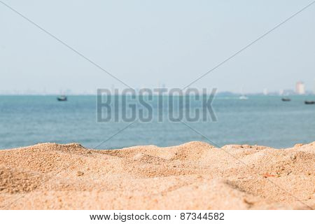 Sand Seaview And City On Background