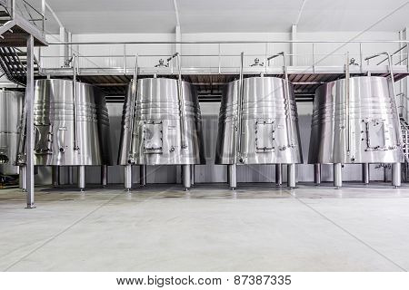modern wine cellar with stainless steel tanks
