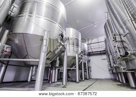 modern wine cellar with stainless steel tanks