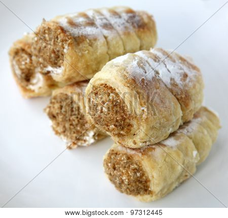 Homemade Tube Of Pastry Filled With Sweet Cream And Nuts