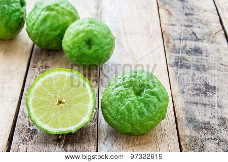 Bergamot On Wooden Table, (kaffir Lime)