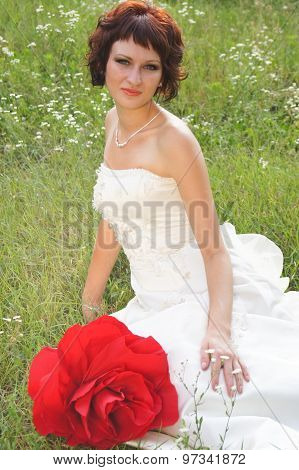 Young beautiful girl in a wedding dress