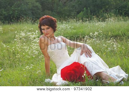 Young beautiful girl in a wedding dress