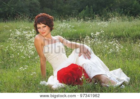 Young beautiful girl in a wedding dress