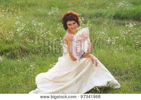Young beautiful girl in a wedding dress