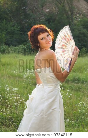 Young beautiful girl in a wedding dress