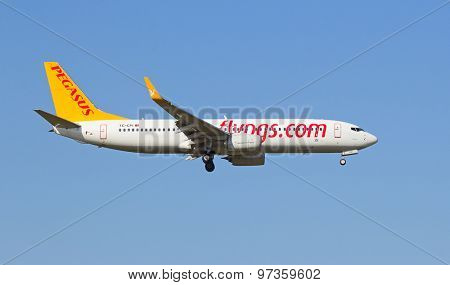 ZURICH - JULY 18: Boeing-737 Pegasus landing in Zurich after short haul flight on July 18, 2015 in Zurich, Switzerland. Zurich airport is home for Swiss Air and one of biggest european hubs.