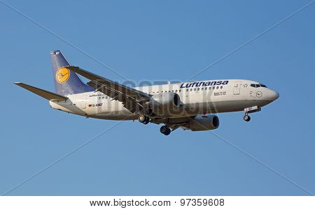 ZURICH - JULY 18: Boeing-737 Lufthansa landing in Zurich after short haul flight on July 18, 2015 in Zurich, Switzerland. Zurich airport is home for Swiss Air and one of biggest european hubs.