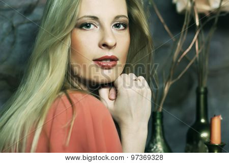 elegant sensual young woman in red dress