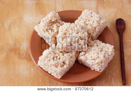 Coconut Candy Cocada On Brown Plate