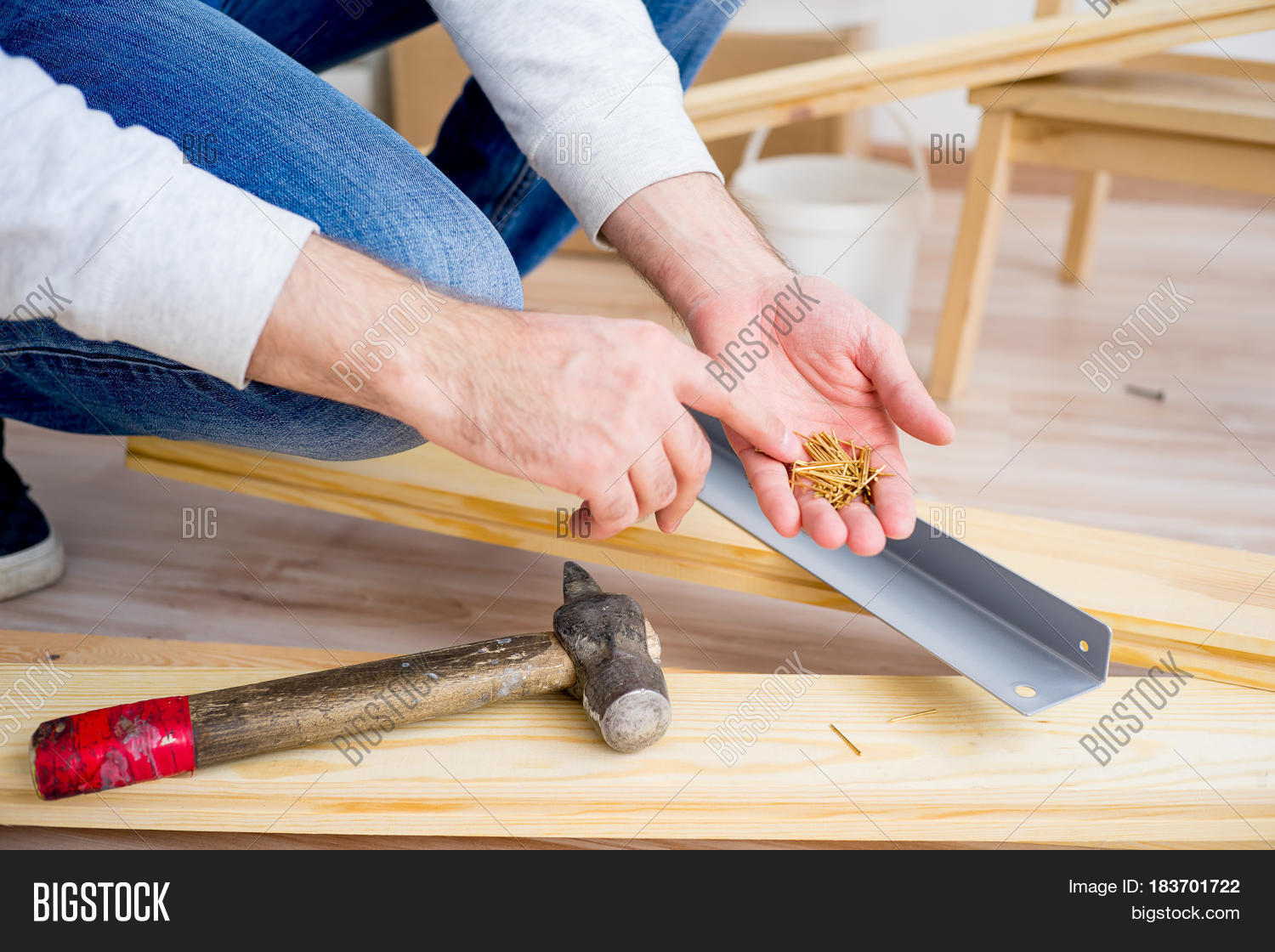 Man Hammering Nails Image & Photo (Free Trial) Bigstock