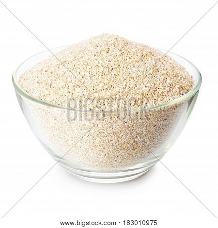 oat bran in transparent glass bowl isolated on white background. Food supplement to improve digestion. Dietary fiber. Product for healthy nutrition and diet