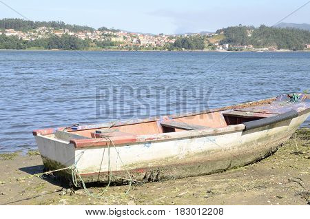 Sailor boat at the foreground of the sea the Rias of Pontevedra in Combarro galicia Spain.