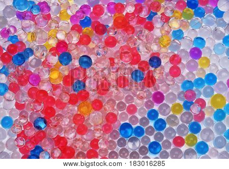 transparent colored water balls texture close up