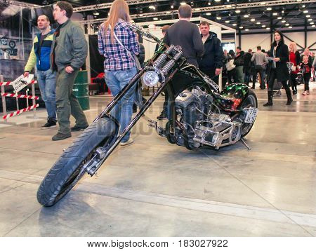 St. Petersburg Russia - 15 April, People have motobike,15 April, 2017.
International Motor Show IMIS-2017 in Expoforurum.
Visitors and participants of the annual moto-salon in St. Petersburg.