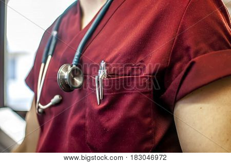young doctors with red coat and stethoscope