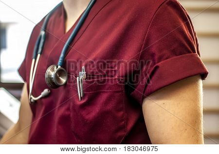 young doctors with red coat and stethoscope