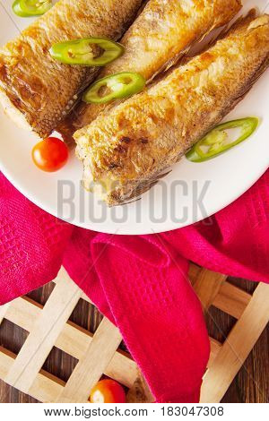 fried shad with chilli australian fish on plate