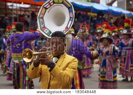 ORURO, BOLIVIA - FEBRUARY 26, 2017: Tinkus dancers in colourful costumes performing at the annual Oruro Carnival. The event is designated by UNESCO as being Intangible Cultural Heritage of Humanity.