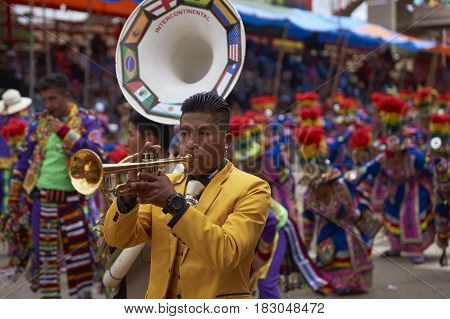 ORURO, BOLIVIA - FEBRUARY 26, 2017: Tinkus dancers in colourful costumes performing at the annual Oruro Carnival. The event is designated by UNESCO as being Intangible Cultural Heritage of Humanity.
