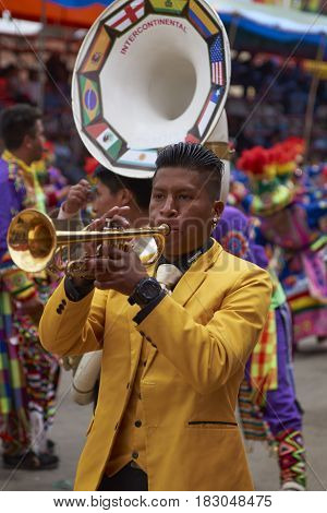 ORURO, BOLIVIA - FEBRUARY 26, 2017: Tinkus dancers in colourful costumes performing at the annual Oruro Carnival. The event is designated by UNESCO as being Intangible Cultural Heritage of Humanity.