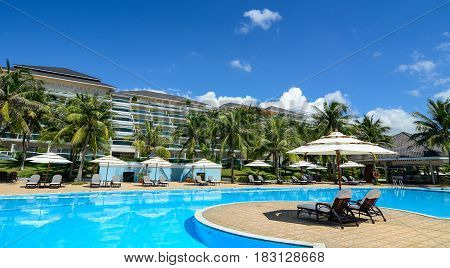 Swimming Pool At Luxury Resort In Sunny Day