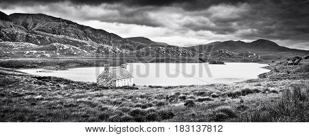 Dramatic Landscape With Old Stone House At A Lake On Isle Of Mull, Scotland
