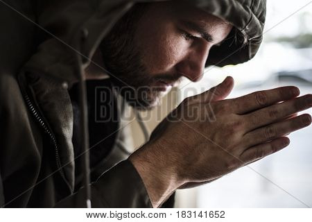 Thoughtful Homeless People Feeling Cold in Winter