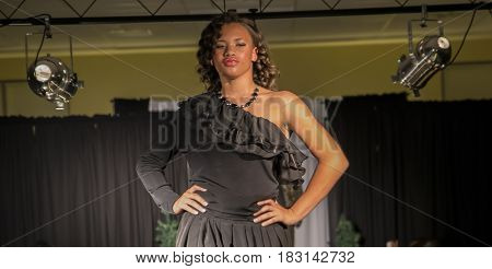 Young Beautiful Black Girl Modeling with golden hair and green eyes