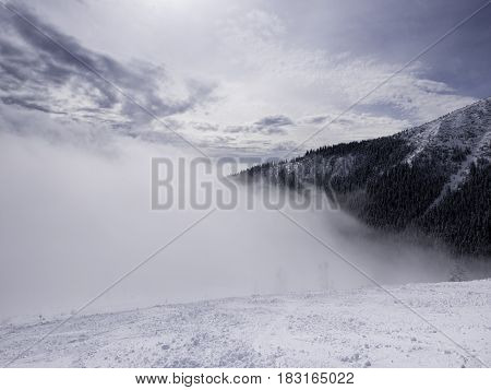 Landscape of Tatra lower mountain in winter time with piste off Jasna Chopok ski resort.