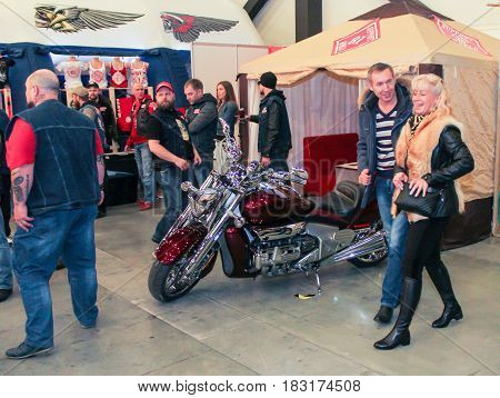 St. Petersburg Russia - 15 April, People around motobike,15 April, 2017.
International Motor Show IMIS-2017 in Expoforurum.
Visitors and participants of the annual moto-salon in St. Petersburg.