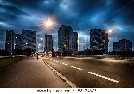 View on modern skyscrapers from Pont de Grenelle in Paris at early morning, France