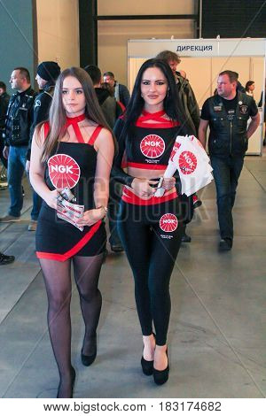 St. Petersburg Russia - 15 April, Young company representatives,15 April, 2017.
International Motor Show IMIS-2017 in Expoforurum.
Visitors and participants of the annual moto-salon in St. Petersburg.