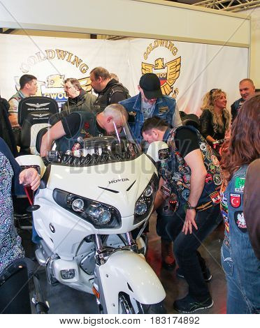 St. Petersburg Russia - 15 April, Bikers at the motorcycle Honda,15 April, 2017.
International Motor Show IMIS-2017 in Expoforurum.
Visitors and participants of the annual moto-salon in St. Petersburg.