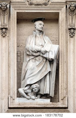 ROME, ITALY - SEPTEMBER 01: Saint Ignatius of Loyola on the facade of the Church of the Gesu, mother church of the Society of Jesus, Rome, Italy on September 01, 2016.