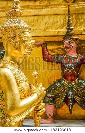 Golden Thai literature giant statue in Wat Prakaew Temple Bangkok Thailand