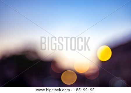 Blurred Background,blue Sky With Silhouettes Building In Evening Time With Boke Light