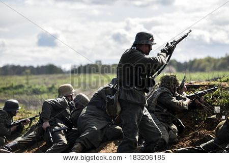 Rosowek Poland april 23 2017: German soldiers. Historical reconstruction soldiers fighting during World War II