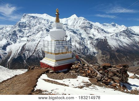 Panoramic view of Annapurna 2 II 3 III 4 IV Ganggapurna and Khangsar Kang Annapurna range with stupa way to Thorung La pass round Annapurna circuit trekking trail Nepal