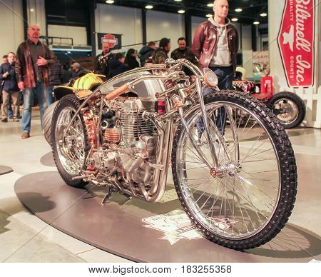 St. Petersburg Russia - 15 April, Retro motorcycle on large wheels,15 April, 2017.
International Motor Show IMIS-2017 in Expoforurum.
Motorcycles and motoconcepts presented at St. Petersburg Motor Show.