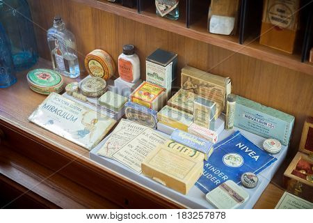 Grodno Belarus - April 5 2017: shelf with retro drugs and medicaments in the pharmacy museum of Grodno in the Historical Center of city. Grodno Belarus.
