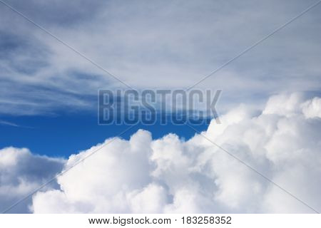 Clouds seen from the airplane and the sunshine nature background