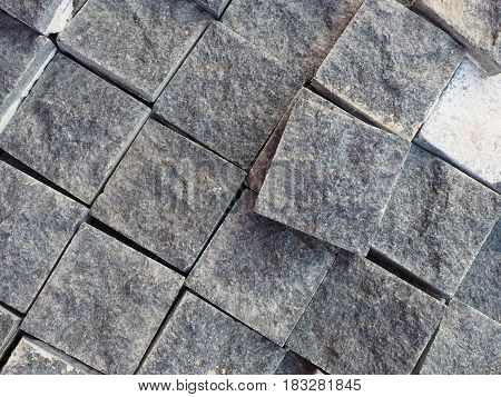Square concrete block on the floor. Top view