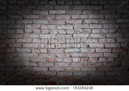 old rick wall texture grunge background with vignetted corners.