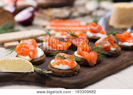Still life - traditional Norwegian cuisine - Brunost and fish