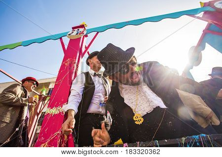 LIMASSOL, CYPRUS - FEBRUARY 26: Grand Carnival Parade - an unidentified people of all ages , gender and nationality in colorful costumes during the street carnival