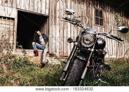 Beautiful Motorcycle Brunette Woman With A Classic Motorcycle (cinema Bleach Bypass Effect)
