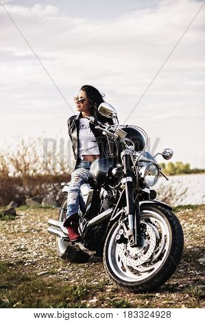 Beautiful Motorcycle Brunette Woman With A Classic Motorcycle (cinema Bleach Bypass Effect)