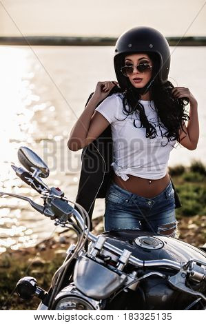 Beautiful Motorcycle Brunette Woman With A Classic Motorcycle (cinema Bleach Bypass Effect)
